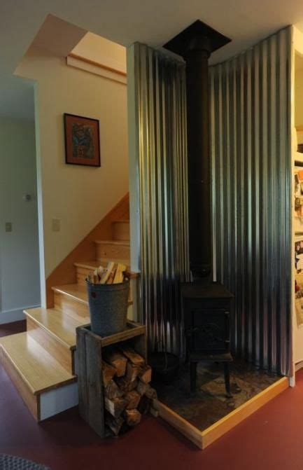 metal wood stove enclosure|corrugated metal behind wood stove.